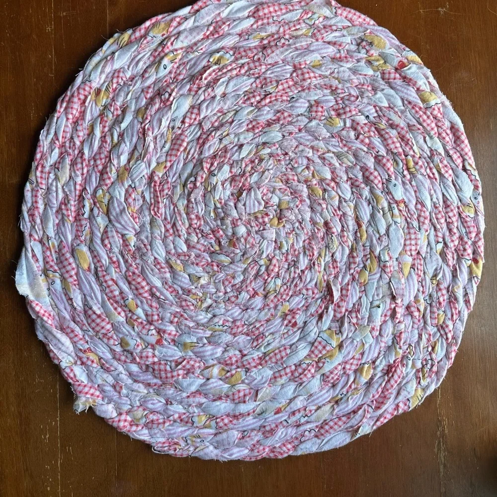 Round Pink and White Braided Rug